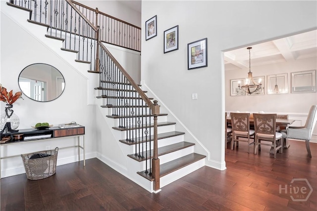 301 Highland Cir, Richmond Hill, GA 31324 - stairs featuring wood finished floors, coffered ceiling, beam ceiling, a chandelier, and baseboards