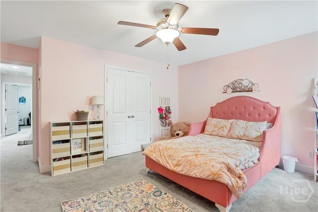 301 Highland Cir, Richmond Hill, GA 31324 - bedroom with carpet floors, a closet, and a ceiling fan