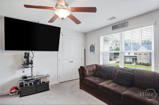 301 Highland Cir, Richmond Hill, GA 31324 - living room featuring carpet, ceiling fan, and baseboards