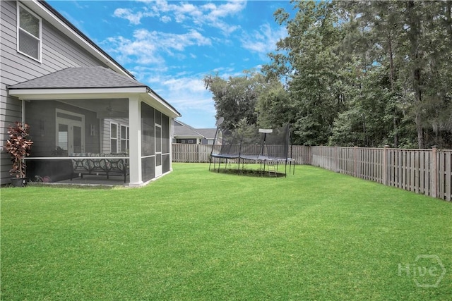 301 Highland Cir, Richmond Hill, GA 31324 - view of yard with a trampoline, a sunroom, and ceiling fan