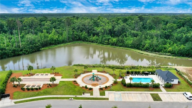 301 Highland Cir, Richmond Hill, GA 31324 - aerial view of a heavily wooded area, a pool, and a nearby body of water