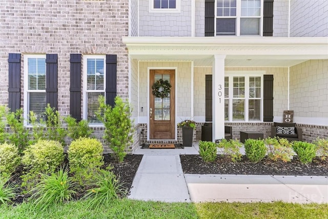 301 Highland Cir, Richmond Hill, GA 31324 - view of exterior entry with a porch