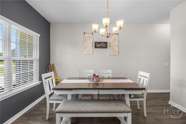 26 Sunflower Cir NE, Ludowici, GA 31316 - dining area with a chandelier, wood finished floors, and baseboards