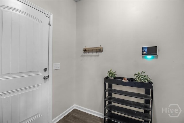 26 Sunflower Cir NE, Ludowici, GA 31316 - entryway featuring dark wood-style flooring and baseboards