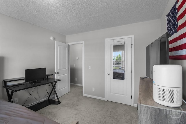 26 Sunflower Cir NE, Ludowici, GA 31316 - bedroom with carpet floors, a textured ceiling, and baseboards