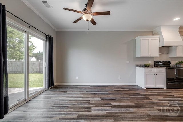 447 Nease Rd, Guyton, GA 31312 - kitchen with black electric range, premium range hood, crown molding, dark wood-style floors, and ceiling fan