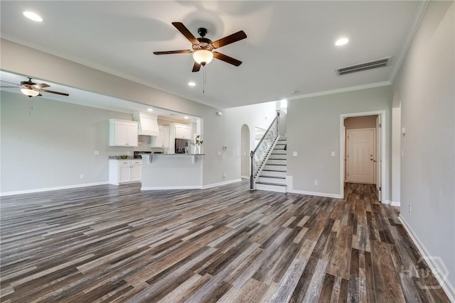447 Nease Rd, Guyton, GA 31312 - unfurnished living room with a ceiling fan, stairs, dark wood finished floors, ornamental molding, and baseboards
