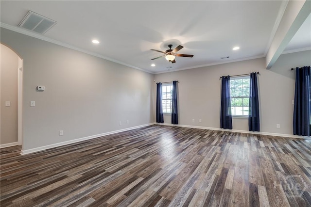 447 Nease Rd, Guyton, GA 31312 - spare room featuring healthy amount of natural light, dark wood-style floors, ceiling fan, arched walkways, and recessed lighting