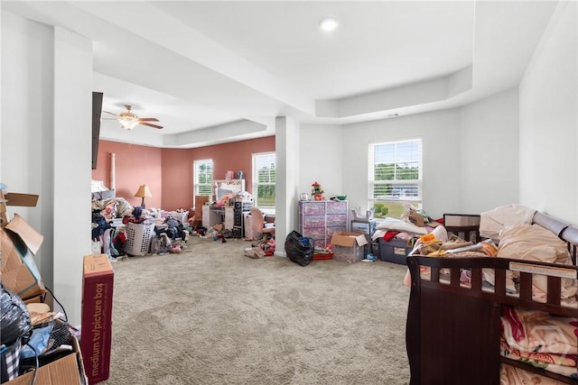 108 Franklins Walk, Rincon, GA 31326 - carpeted bedroom featuring a tray ceiling and ceiling fan