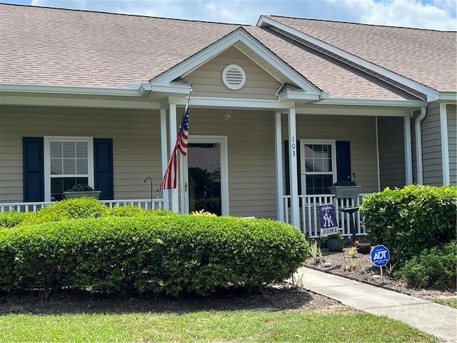 103 Travertine Cir, Savannah, GA 31419 - property entrance with covered porch and roof with shingles