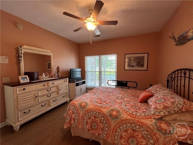 103 Travertine Cir, Savannah, GA 31419 - bedroom with a textured ceiling, dark wood-style floors, and ceiling fan