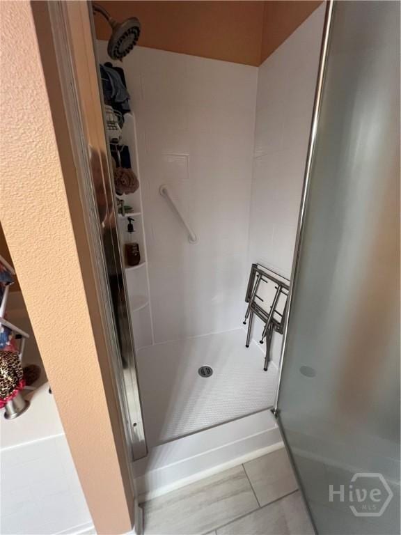 103 Travertine Cir, Savannah, GA 31419 - bathroom with a shower stall and tile patterned floors
