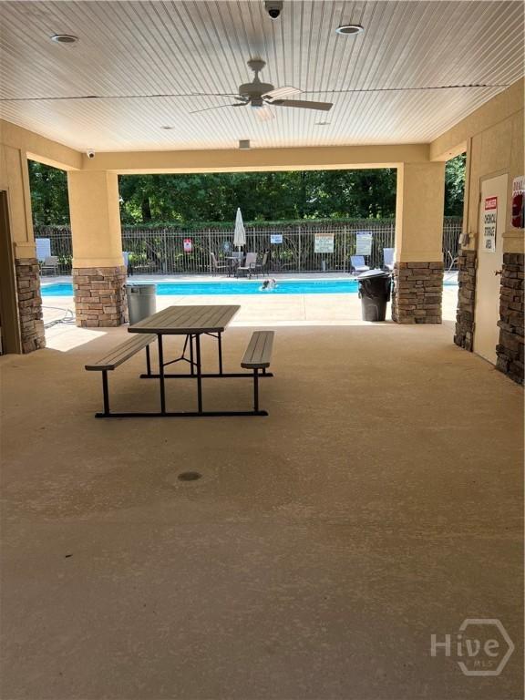 103 Travertine Cir, Savannah, GA 31419 - community pool featuring a ceiling fan and a patio area