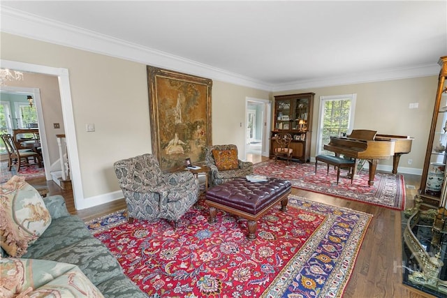 320 Wedgefield Xing, Savannah, GA 31405 - living room with crown molding, wood finished floors, and baseboards