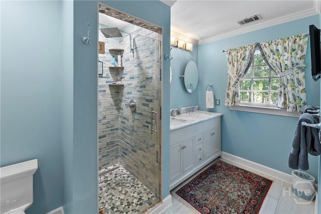 320 Wedgefield Xing, Savannah, GA 31405 - full bath with a stall shower, double vanity, toilet, ornamental molding, and baseboards