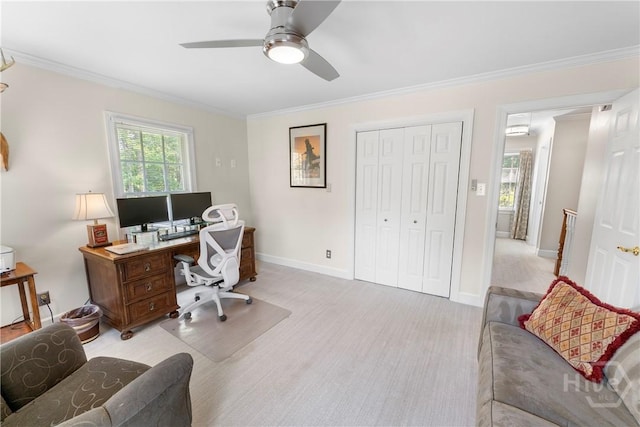 320 Wedgefield Xing, Savannah, GA 31405 - home office with ornamental molding, a ceiling fan, baseboards, and light carpet