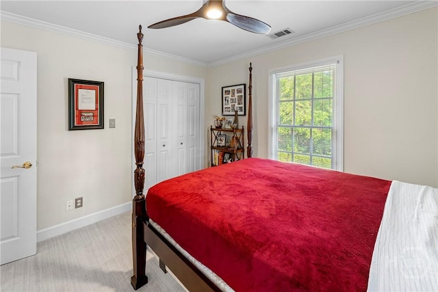 320 Wedgefield Xing, Savannah, GA 31405 - bedroom featuring light colored carpet, ornamental molding, baseboards, a ceiling fan, and a closet