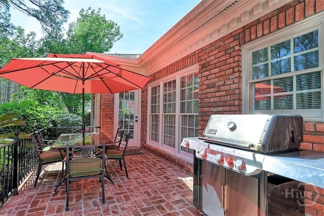 320 Wedgefield Xing, Savannah, GA 31405 - view of patio / terrace with a grill and outdoor dining area
