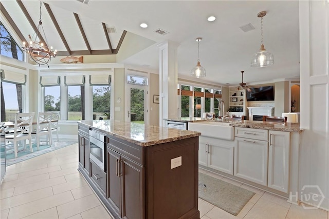 268 Catherine Vw, Richmond Hill, GA 31324 - kitchen featuring a sink, open floor plan, healthy amount of natural light, light tile patterned flooring, and recessed lighting