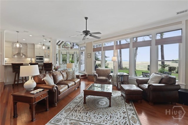 268 Catherine Vw, Richmond Hill, GA 31324 - living room featuring a ceiling fan, dark wood-style flooring, and recessed lighting