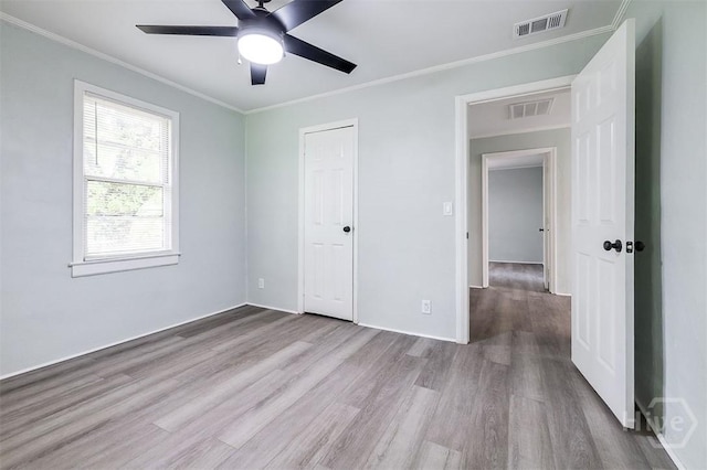 133 Parsons Ave, Pooler, GA 31322 - unfurnished bedroom featuring wood finished floors, crown molding, ceiling fan, and baseboards