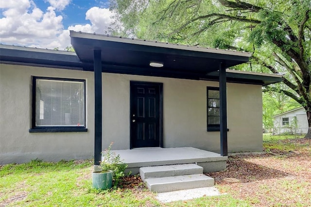 133 Parsons Ave, Pooler, GA 31322 - property entrance featuring stucco siding and a porch