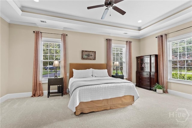 325 Shadow Moss Cir, Richmond Hill, GA 31324 - bedroom featuring a raised ceiling, crown molding, multiple windows, carpet floors, and recessed lighting