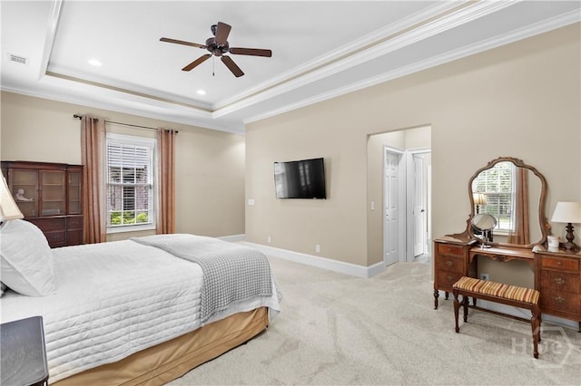 325 Shadow Moss Cir, Richmond Hill, GA 31324 - bedroom featuring multiple windows, crown molding, light colored carpet, a raised ceiling, and ceiling fan