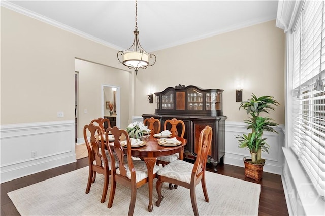 325 Shadow Moss Cir, Richmond Hill, GA 31324 - dining space featuring healthy amount of natural light, wainscoting, crown molding, and dark wood-style flooring