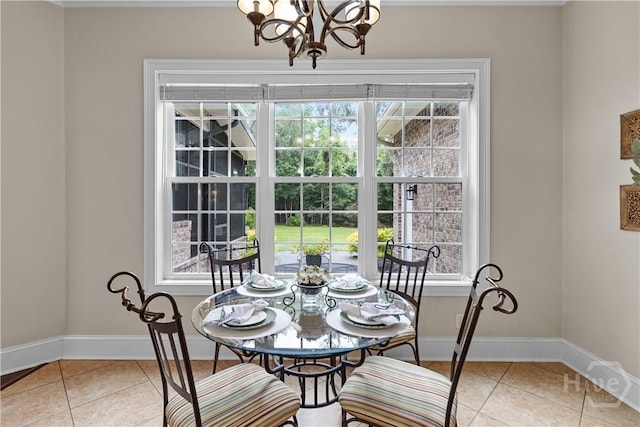 325 Shadow Moss Cir, Richmond Hill, GA 31324 - dining room featuring light tile patterned floors and a chandelier
