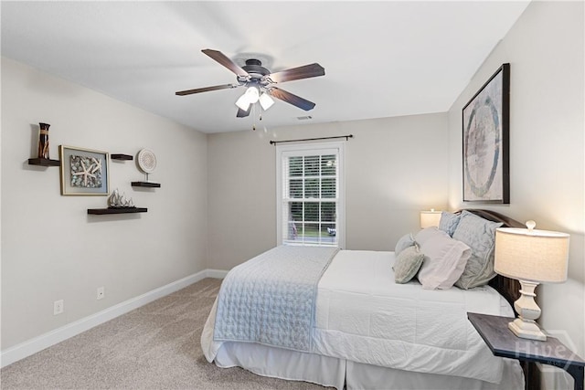 325 Shadow Moss Cir, Richmond Hill, GA 31324 - carpeted bedroom with baseboards and ceiling fan