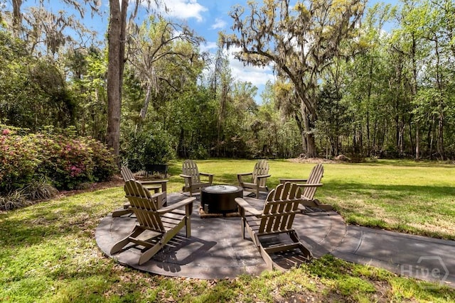 325 Shadow Moss Cir, Richmond Hill, GA 31324 - view of patio with an outdoor fire pit