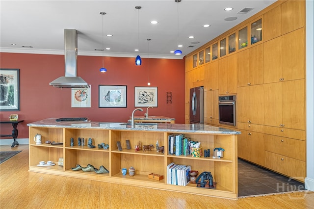 27 Mainsail Xing, Savannah, GA 31411 - kitchen with island exhaust hood, appliances with stainless steel finishes, a sink, crown molding, and open shelves