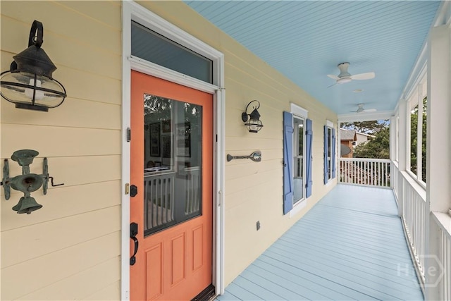 130 Lewis Ave, Tybee Island, GA 31328 - view of exterior entry featuring a ceiling fan and covered porch
