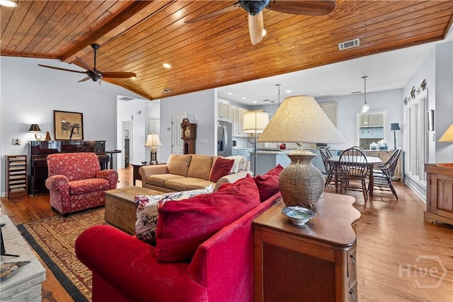 130 Lewis Ave, Tybee Island, GA 31328 - living area with ceiling fan, wood ceiling, light wood-type flooring, recessed lighting, and baseboards