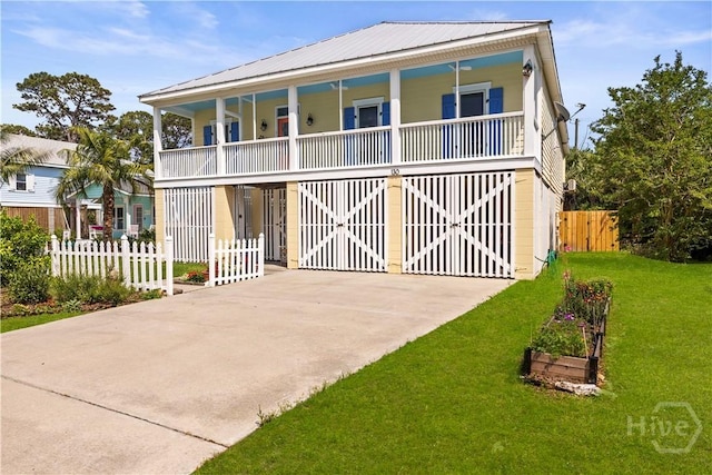 130 Lewis Ave, Tybee Island, GA 31328 - coastal inspired home featuring metal roof