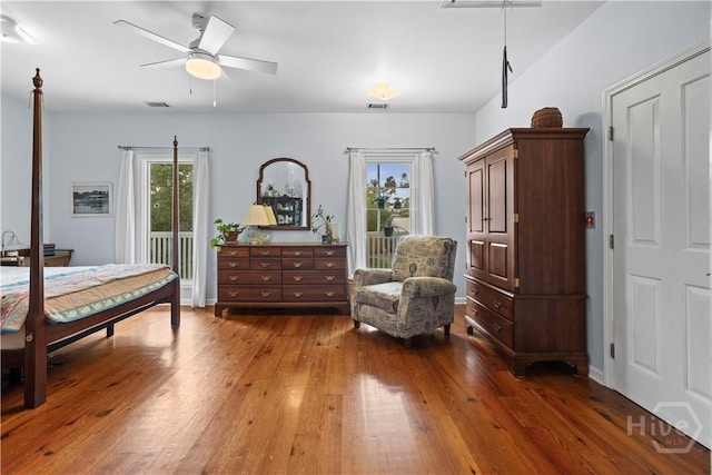 130 Lewis Ave, Tybee Island, GA 31328 - bedroom featuring wood-type flooring, a ceiling fan, and access to outside