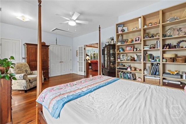 130 Lewis Ave, Tybee Island, GA 31328 - bedroom with wood finished floors, attic access, and ceiling fan