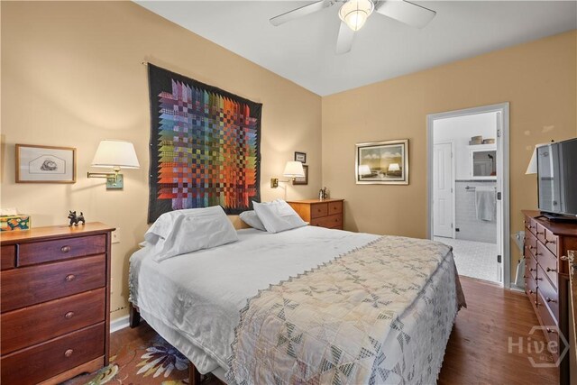 130 Lewis Ave, Tybee Island, GA 31328 - bedroom featuring dark wood-style floors, ceiling fan, and connected bathroom