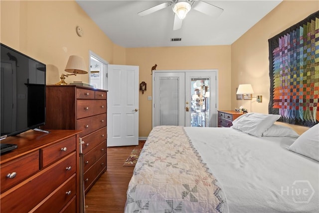 130 Lewis Ave, Tybee Island, GA 31328 - bedroom featuring access to exterior, dark wood finished floors, and ceiling fan