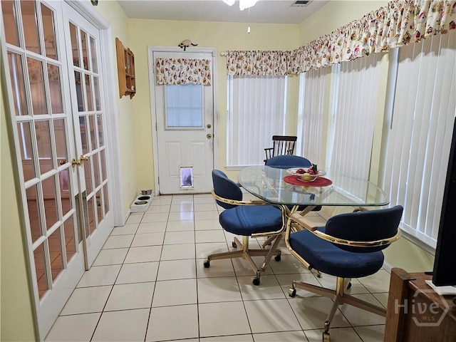127 Lakeshore Dr, Savannah, GA 31419 - dining area featuring french doors and light tile patterned flooring
