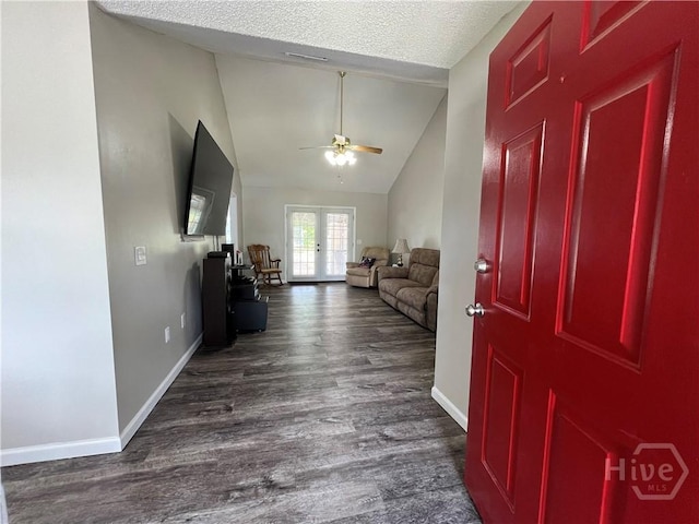43 Fabian Ln, Hinesville, GA 31313 - foyer entrance featuring dark wood-style flooring, french doors, vaulted ceiling, a ceiling fan, and baseboards