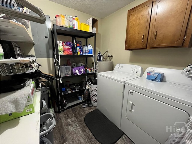 43 Fabian Ln, Hinesville, GA 31313 - washroom with cabinet space, washing machine and clothes dryer, dark wood-style floors, electric panel, and a textured ceiling