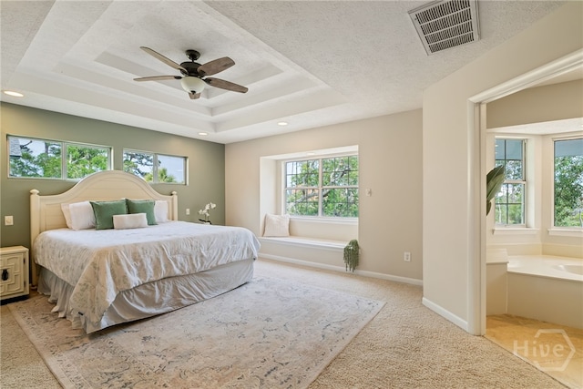 108 San Marco Dr, Tybee Island, GA 31328 - bedroom featuring a raised ceiling, light carpet, recessed lighting, ceiling fan, and baseboards