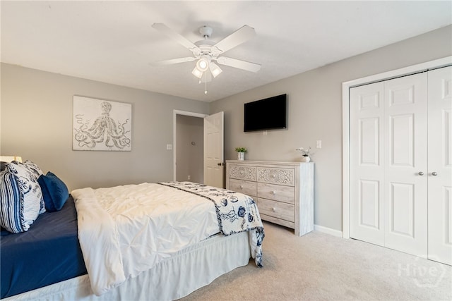 108 San Marco Dr, Tybee Island, GA 31328 - bedroom featuring a closet, light colored carpet, ceiling fan, and baseboards