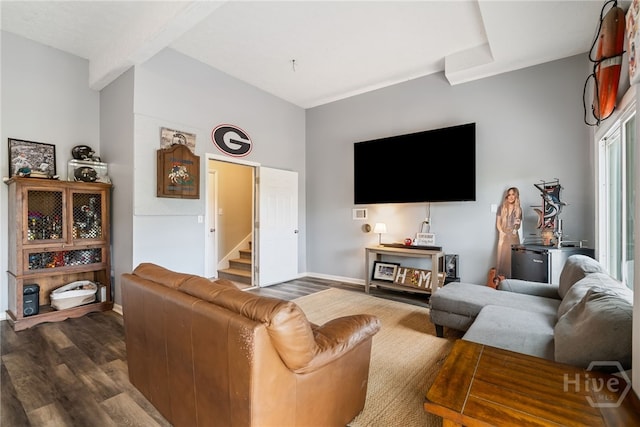 108 San Marco Dr, Tybee Island, GA 31328 - living room with dark wood finished floors, baseboards, and stairway