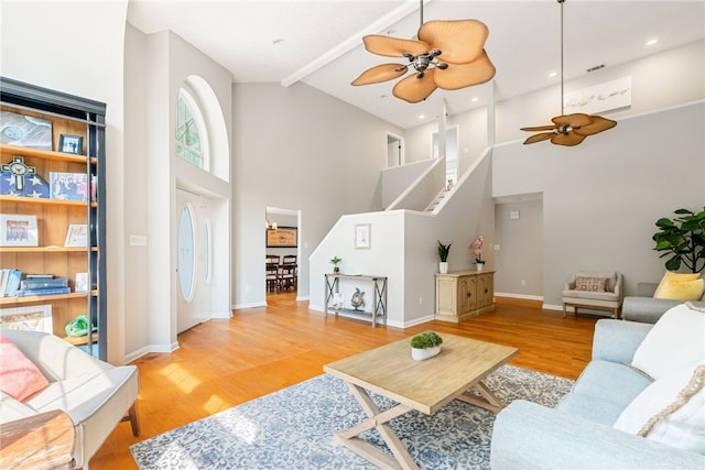 108 San Marco Dr, Tybee Island, GA 31328 - living room with ceiling fan, high vaulted ceiling, wood finished floors, and beam ceiling