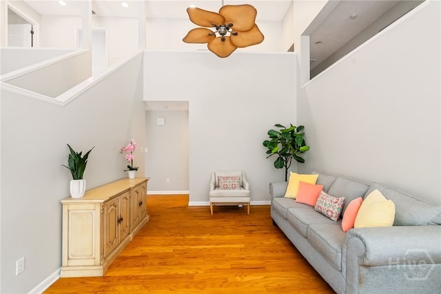 108 San Marco Dr, Tybee Island, GA 31328 - living area with light wood-type flooring, ceiling fan, recessed lighting, and a towering ceiling