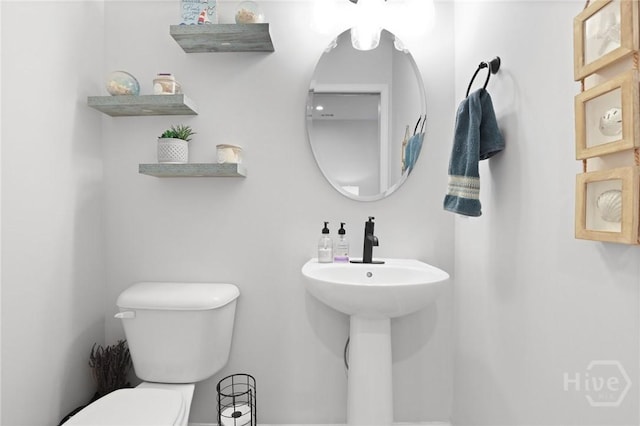 73 Small Pine Ln, Richmond Hill, GA 31324 - half bathroom featuring toilet