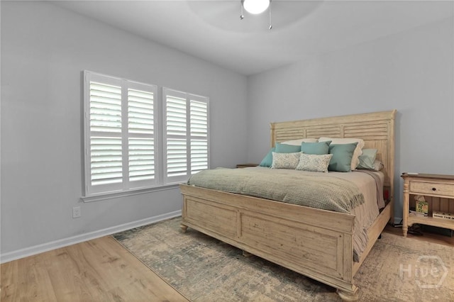 73 Small Pine Ln, Richmond Hill, GA 31324 - bedroom featuring wood finished floors, baseboards, and a ceiling fan